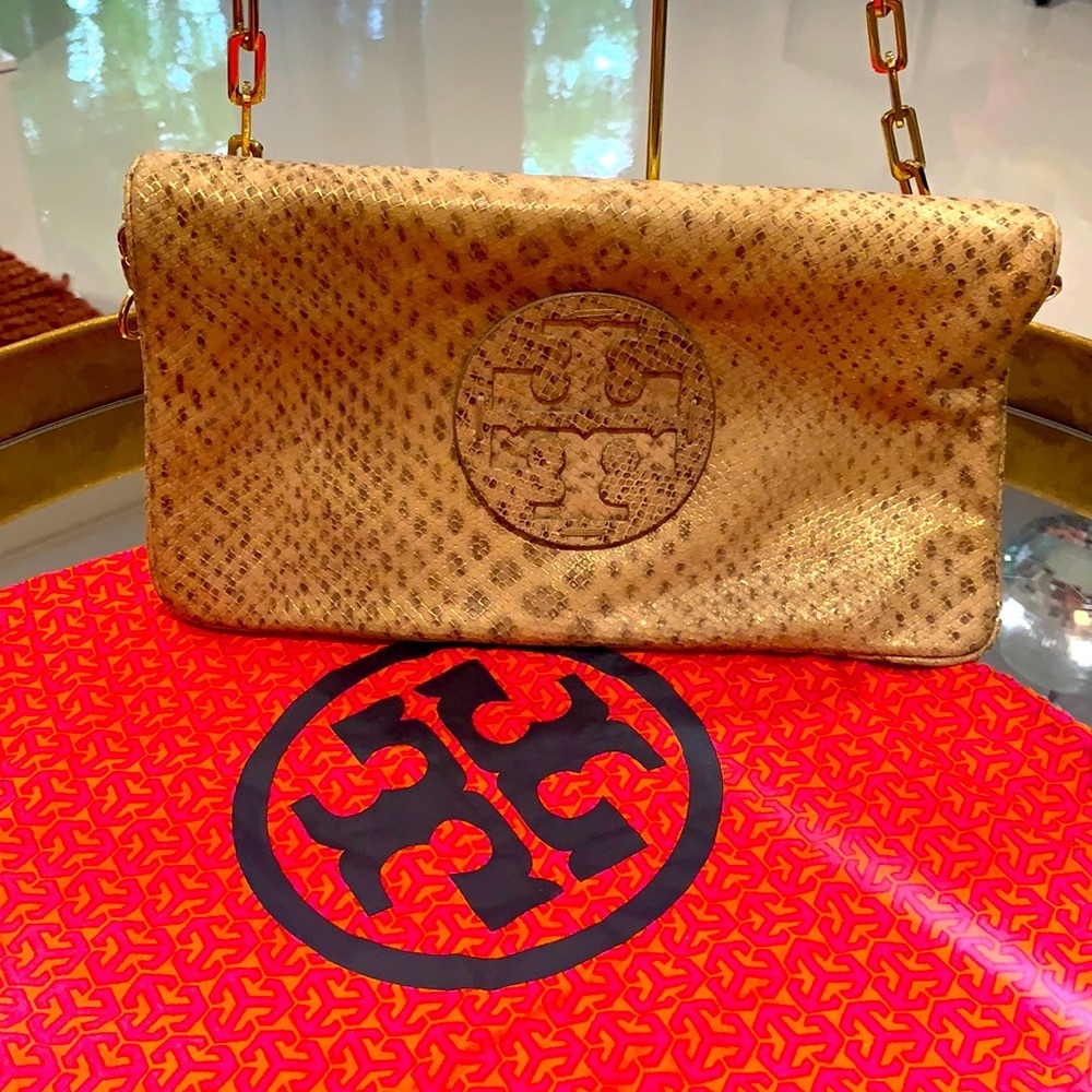 Mint condition Tory Burch Animal print Reva clutch